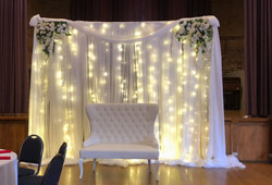 lighted backdrop with flowers