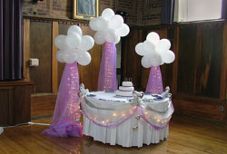 Cake table with Fantasy Cloud Backdrop