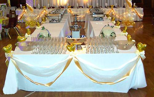Buffet table with ribbon draping